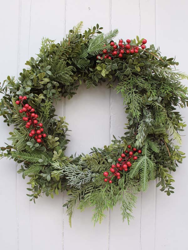 
                  
                    red berries on wreath
                  
                