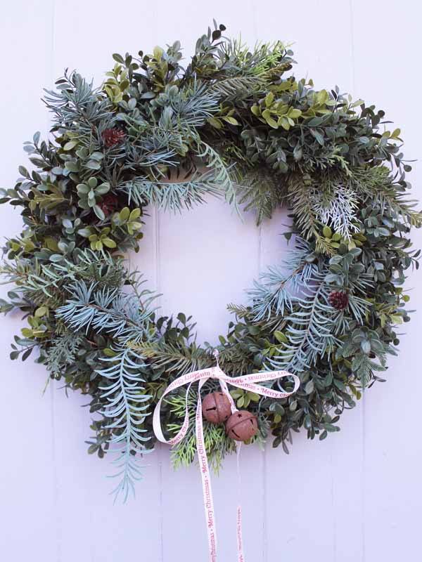 
                  
                    christmas wreath with bells
                  
                